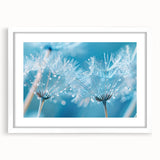 Abstract art print featuring close-up water design in muted blue and white tones, framed with a white mat.