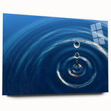 Large abstract wall art depicting water close-ups in blue and green hues on acrylic glass.