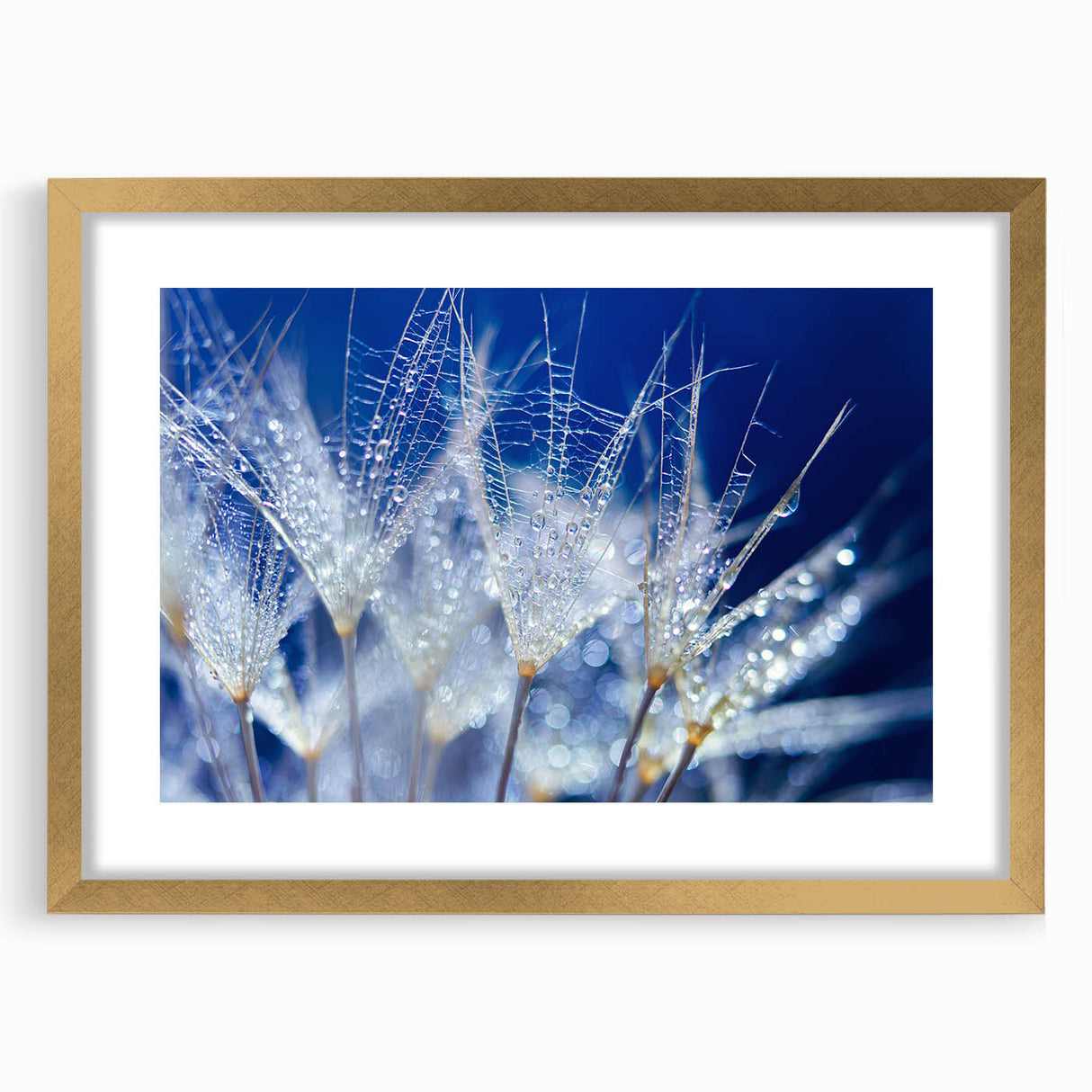 Extra large abstract art print featuring textured, swirling water design in blue and white hues, framed in gold.