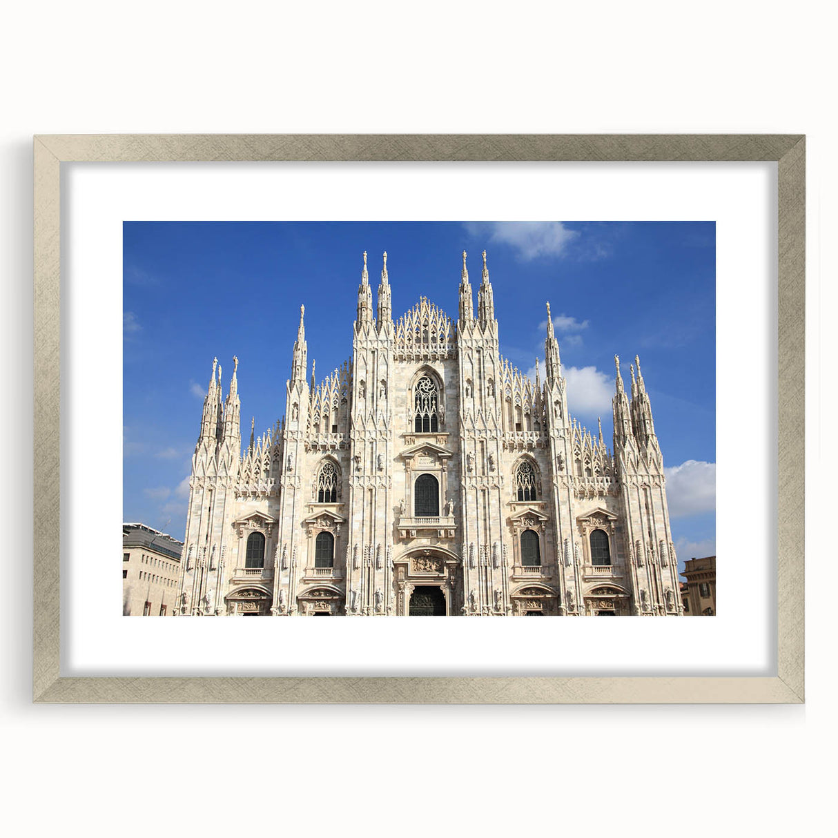 Abstract art print of a cathedral, featuring muted blue and gray tones on a framed silver mat, ideal for dining room decor.