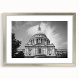 Abstract art print of a cathedral in muted gray and blue tones on a framed poster, suitable for dining room decor.
