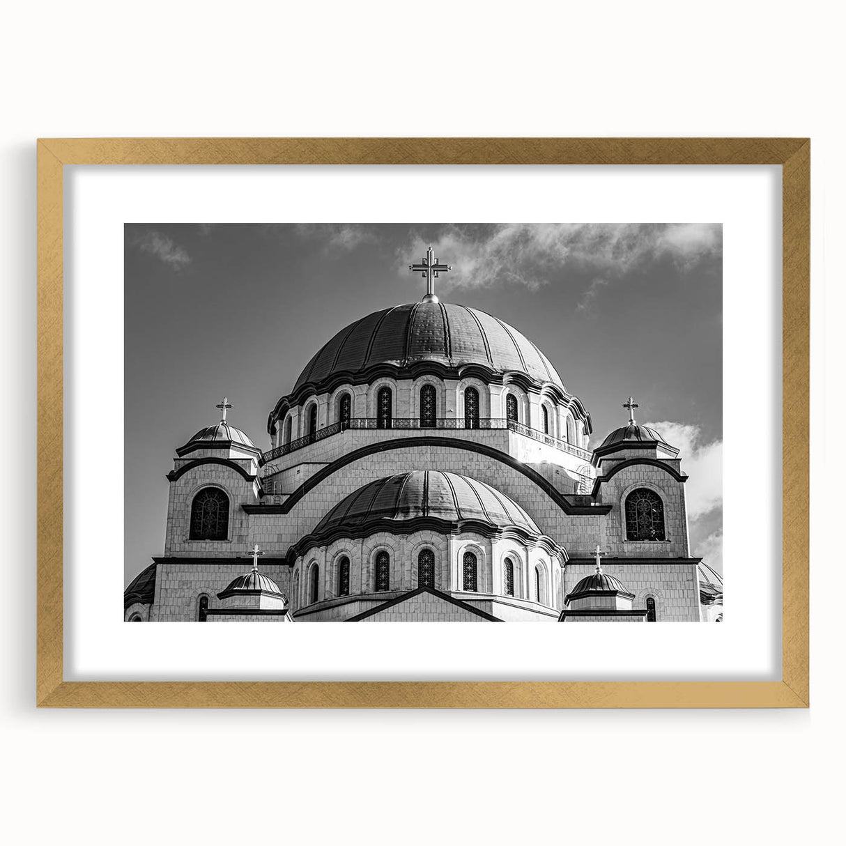 Textured abstract art print of a cathedral, in muted gold and beige tones on a framed canvas, suitable for bedroom decor.