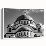 Framed canvas of a vintage-style cathedral landscape in muted black and white tones, ideal for bedroom wall decor.