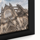 Black wall art depicting a cathedral with colorful, textured details on a framed canvas, ideal for living room decor.