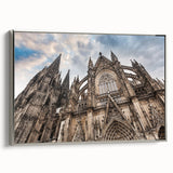 Vintage poster art of a cathedral design on framed canvas, featuring black and colorful art elements.