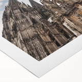 Art Deco poster of a cathedral, featuring geometric shapes in subdued colors, ideal for dining room wall art.