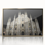 Mid-century modernist art depicting a cathedral, in muted gold tones on a framed acrylic, suitable for nursery wall decor.