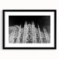 Extra large abstract art print featuring a colorful, textured depiction of a cathedral, framed in black.