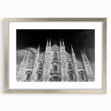 Abstract art print of a cathedral, featuring a blend of muted gray and blue tones on a framed silver mat.