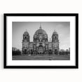 Abstract art print featuring a colorful church design in textured style on a large black framed canvas.