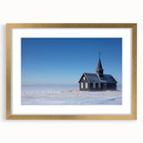 Textured abstract art print of a church, in muted gold and cream tones, framed with a gold mat, ideal for bedroom art.