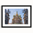 Extra large abstract art print featuring a colorful, textured depiction of a church, framed in black.