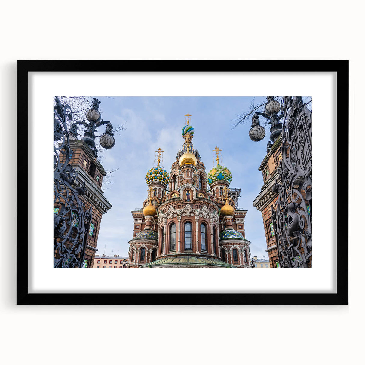 Extra large abstract art print featuring a colorful, textured depiction of a church, framed in black.