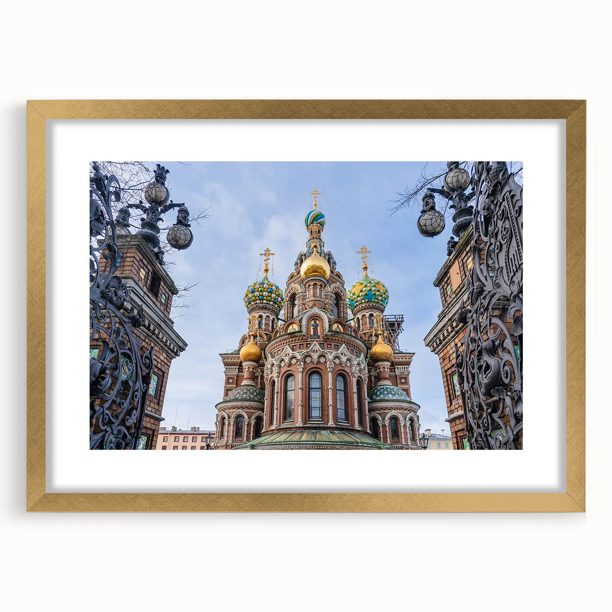 Textured abstract art print of a church in muted gold and white tones on a framed canvas, suitable for bedroom decor.