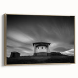 Framed canvas featuring a vintage-style landscape painting of a church with a black and colorful palette.