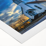 Art deco poster of a stylized church in muted gold and black tones on rolled canvas, suitable for dining room or bathroom.