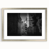 Abstract art print of a stylized mosque in silver and gray tones on a framed canvas.