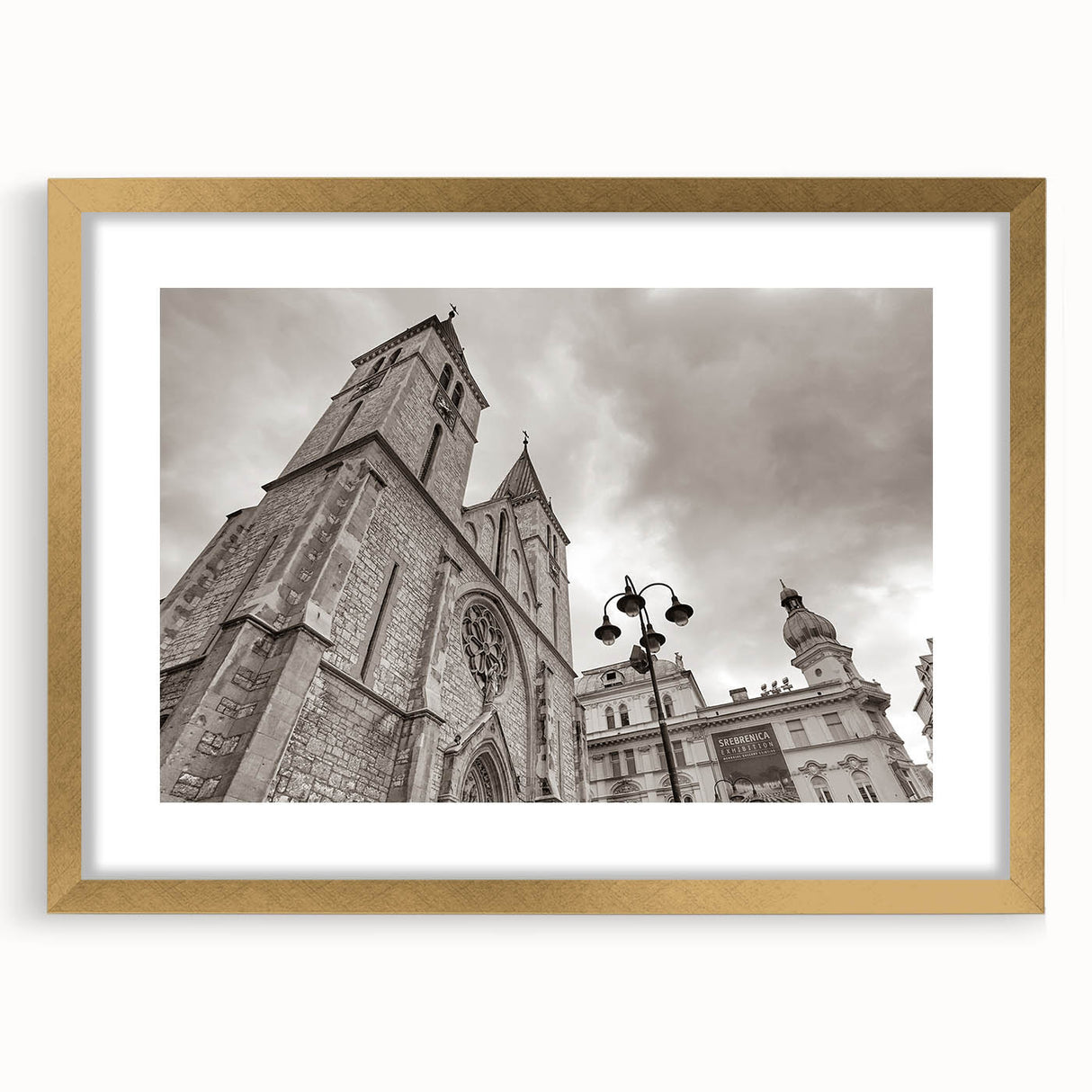 Textured abstract art print of a mosque in muted gold and beige tones, framed with a mat, ideal for bedroom art.