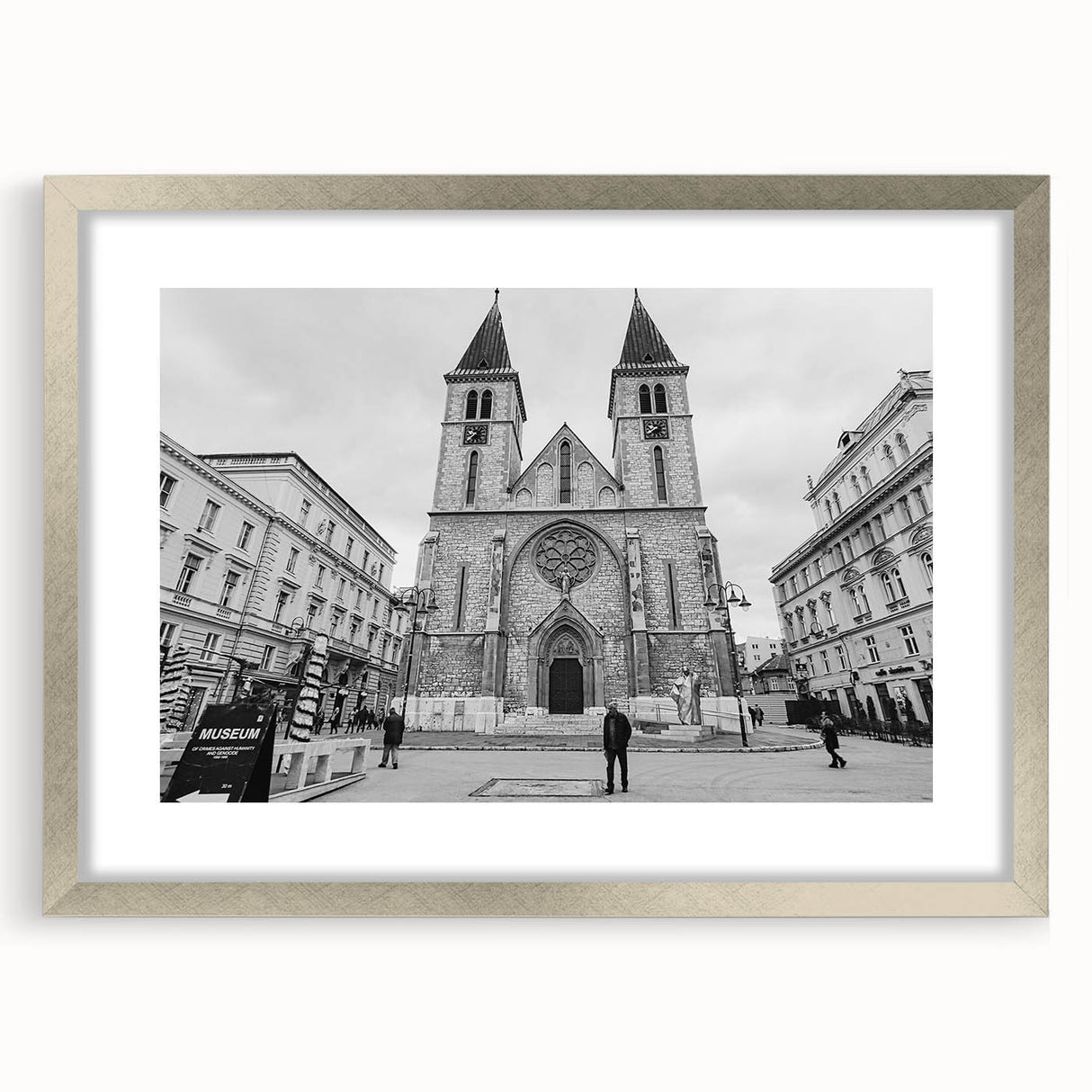 Abstract art print of a mosque in muted gray and blue tones, framed with a silver mat, suitable for dining room decor.