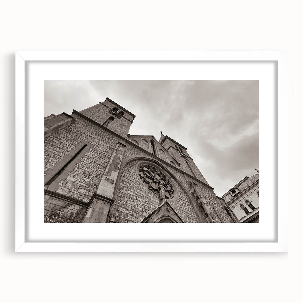 Extra large abstract art print of a mosque in textured tones of cream and beige, framed in white.
