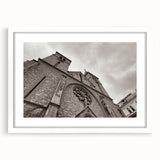 Extra large abstract art print of a mosque in textured tones of cream and beige, framed in white.