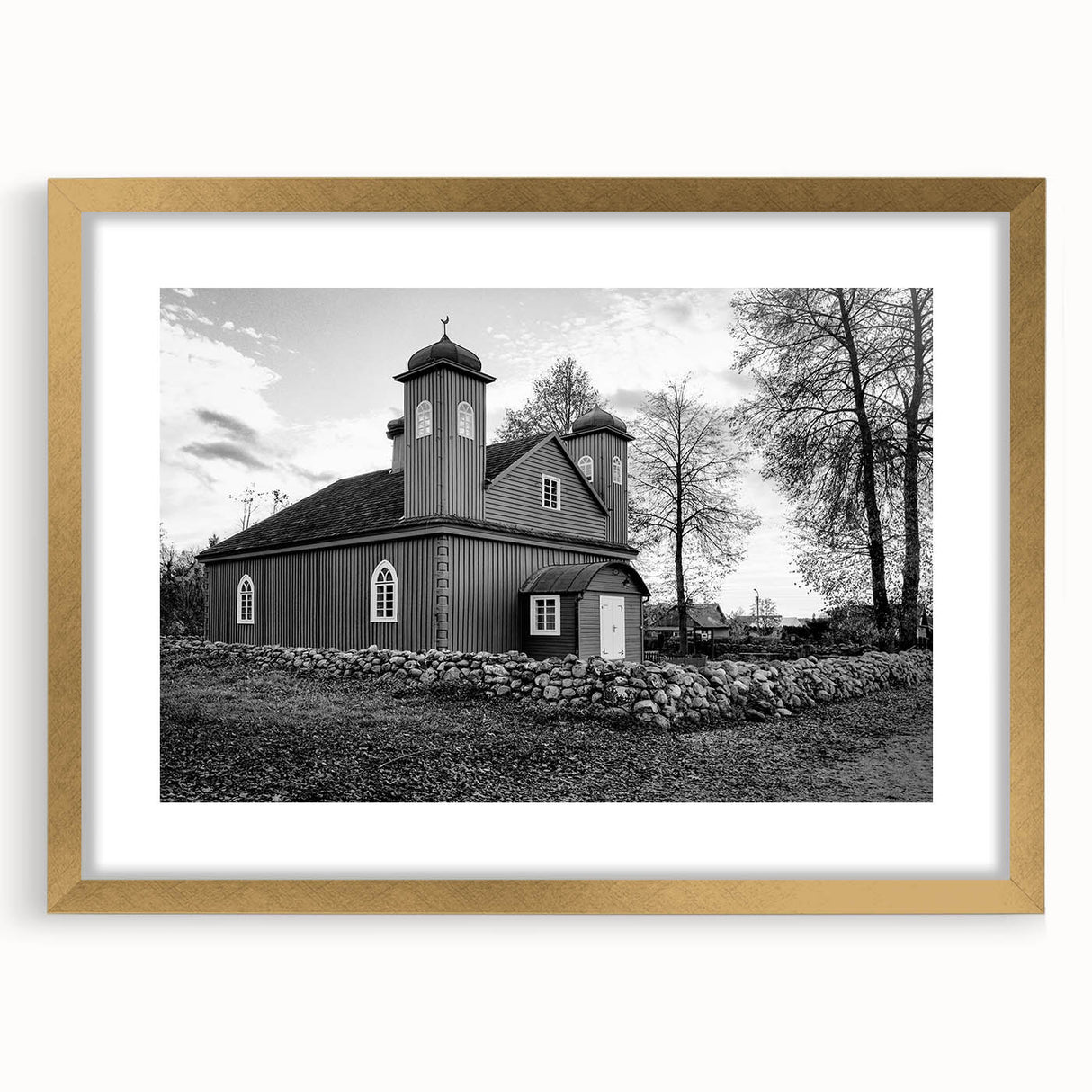 Textured art print of an abstract mosque design in gold and beige tones, framed with mat, suitable for bedroom decor.