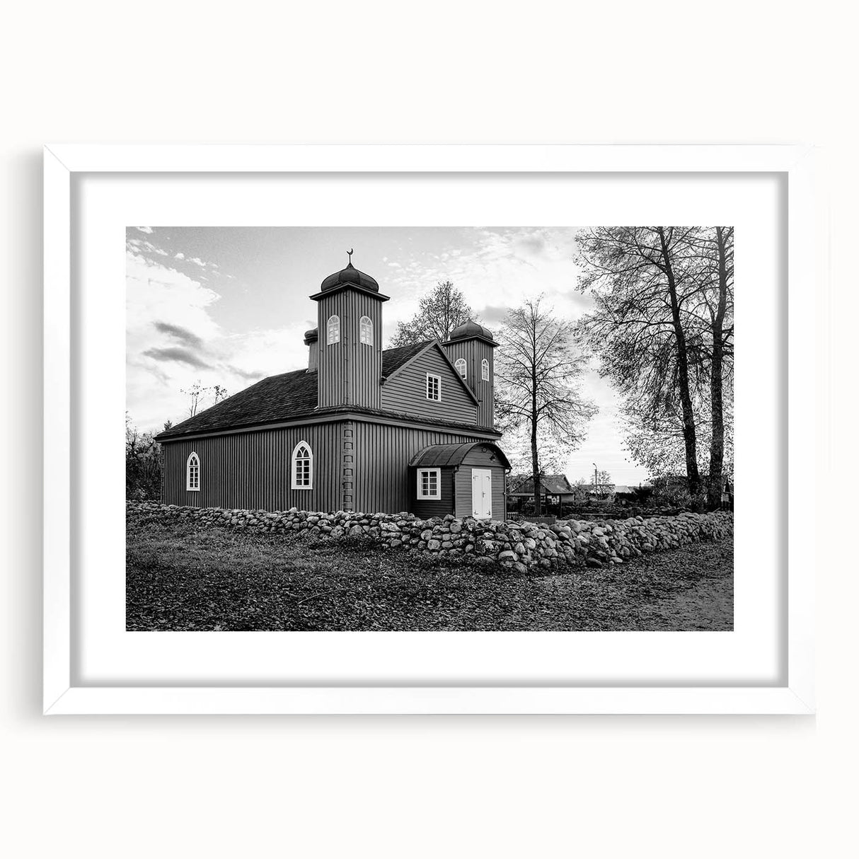Extra large abstract art print of a mosque in textured whites and grays, framed with a white mat.