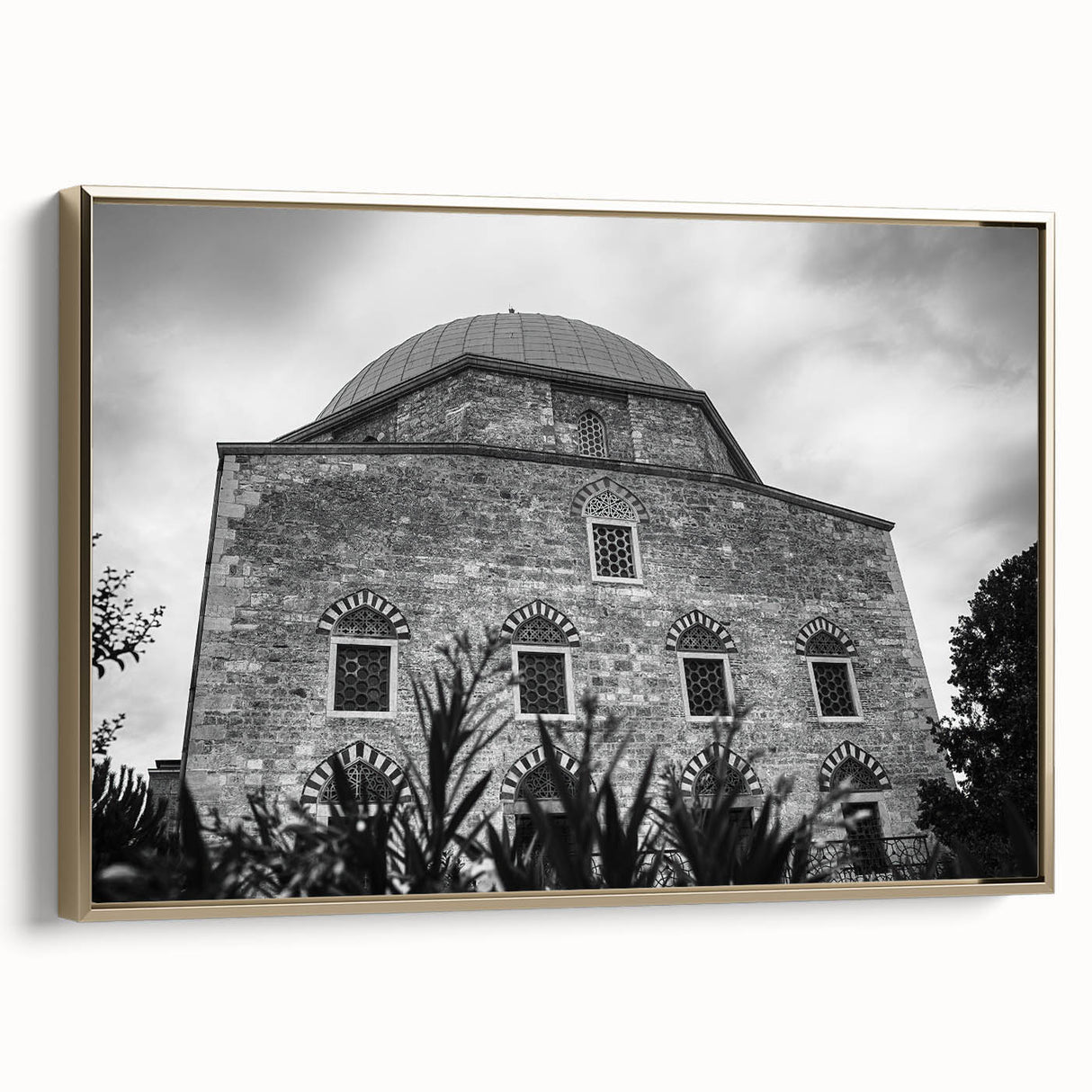 Landscape art painting of a mosque with vibrant gold and black tones on a framed canvas, ideal for living room decor.