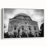 Framed canvas featuring a black and white vintage poster of a mosque landscape, ideal for bedroom wall art.