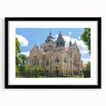 Extra large abstract art print of a colorful synagogue, textured design on a black framed canvas.