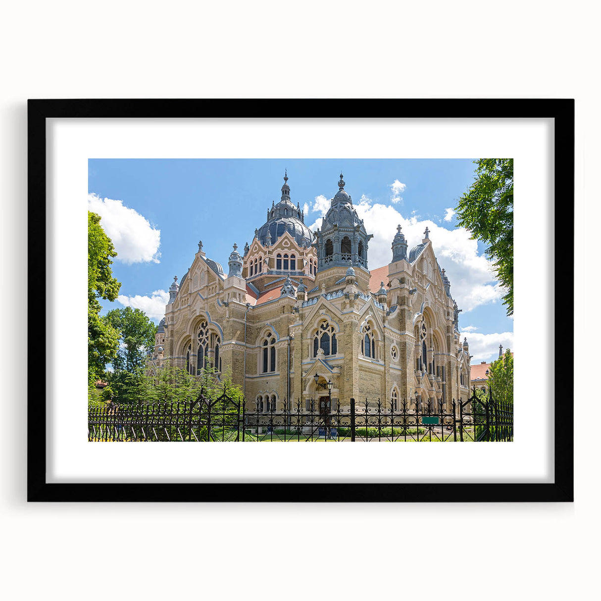 Extra large abstract art print of a colorful synagogue, textured design on a black framed canvas.