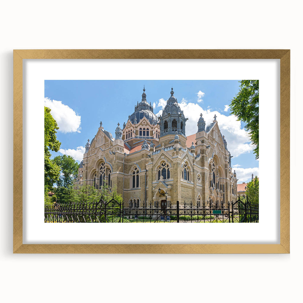 Abstract textured art print of a synagogue in muted gold and beige, framed with mat, suitable for bedroom decor.