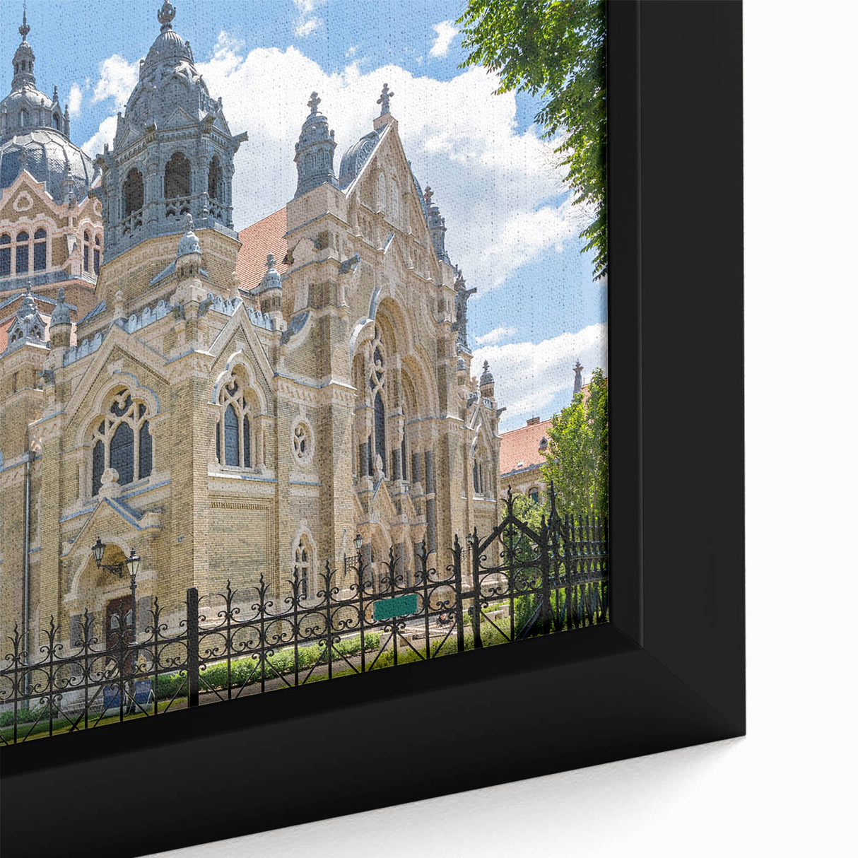 Framed canvas featuring a textured synagogue design in black with colorful accents, ideal for living room decor.
