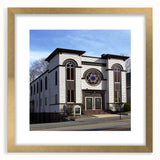 Textured abstract art print of a synagogue in muted gold and beige tones, framed with a gold mat.