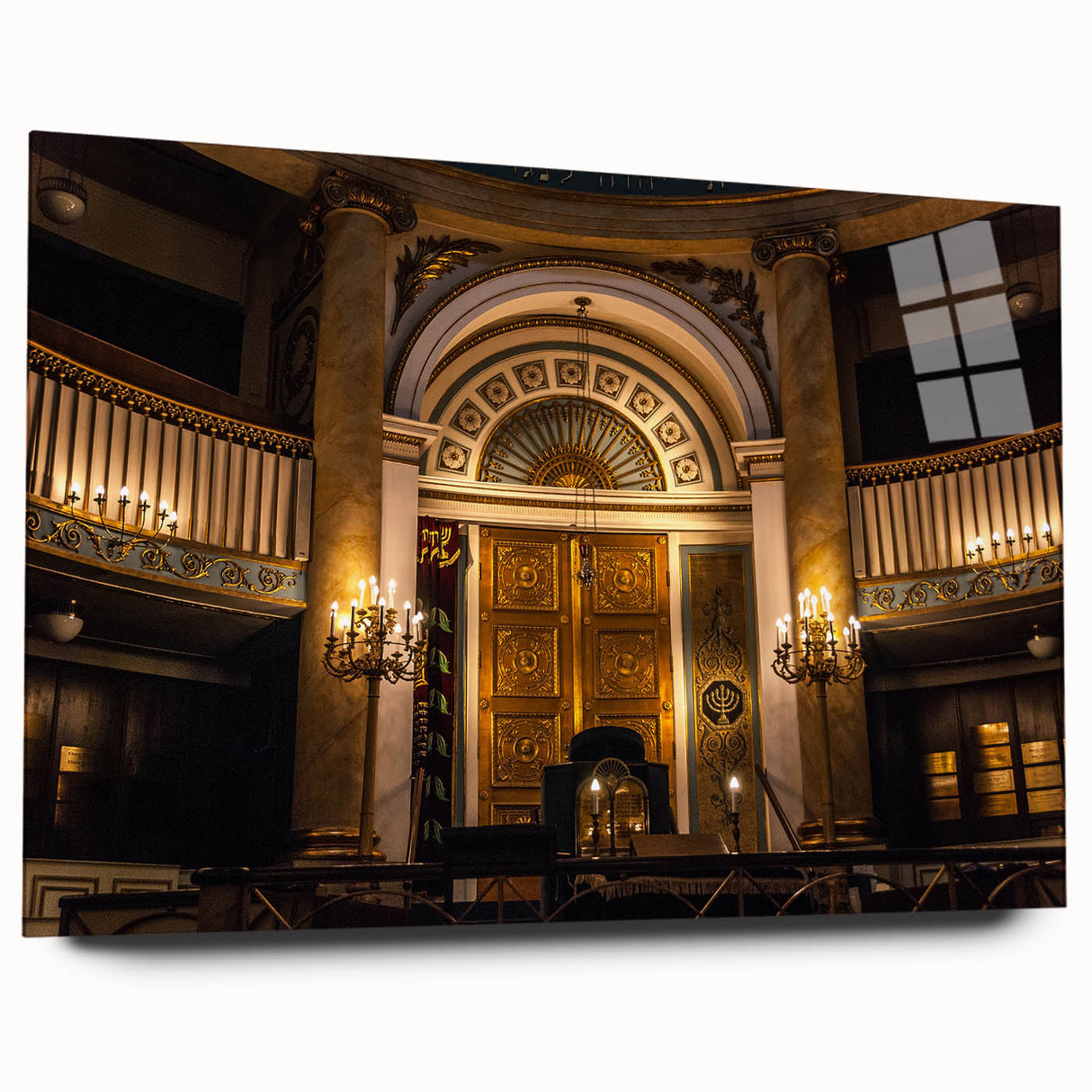 Large abstract wall art featuring a synagogue design in muted browns and blues on acrylic glass.