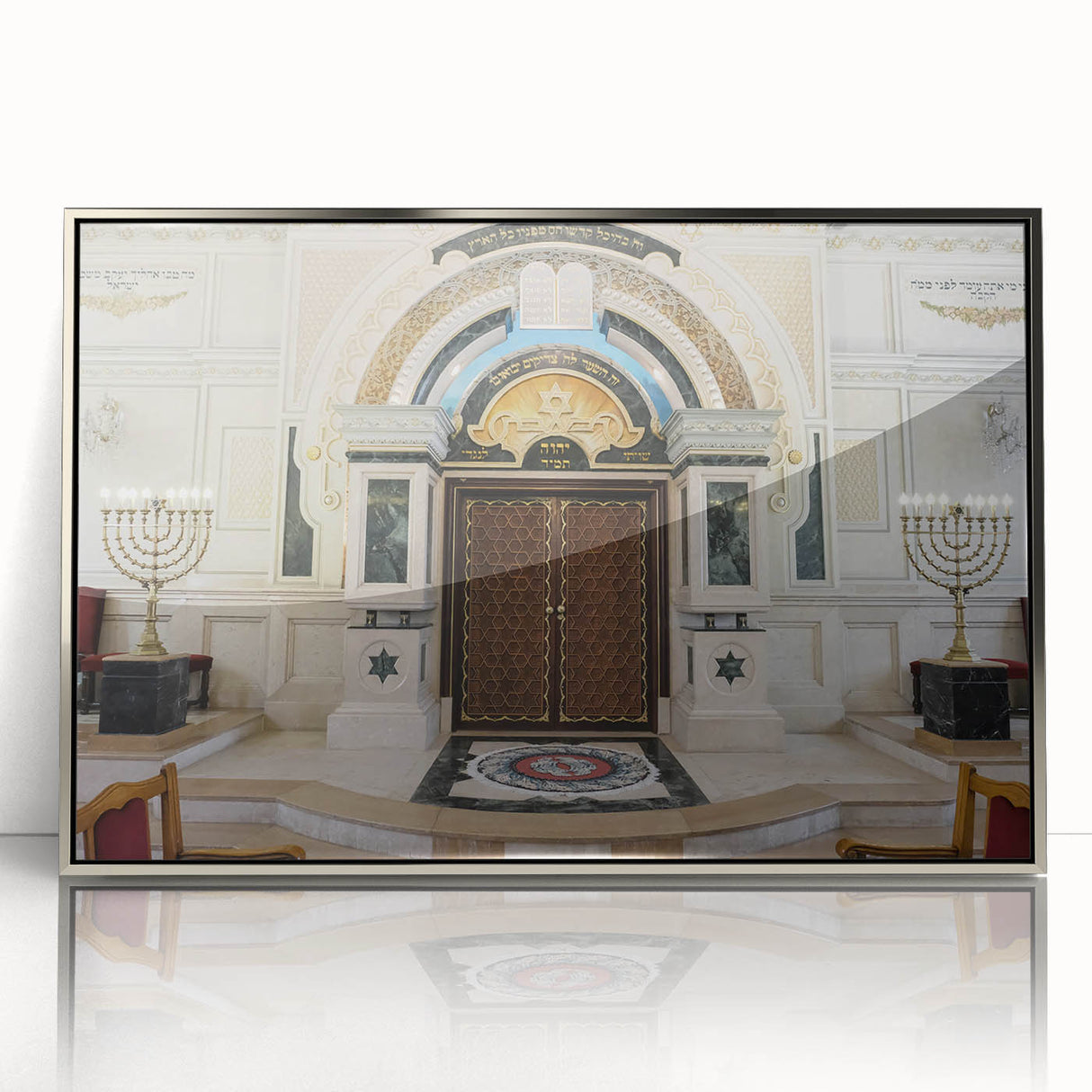 Art Deco poster of a synagogue, featuring geometric shapes in silver and gray tones, framed in acrylic.
