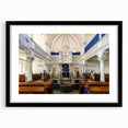 Abstract art print of a colorful synagogue design in vibrant hues on a large framed canvas, suitable for living room decor.