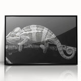 Framed wall art featuring a vibrant chameleon design in a sleek black frame, showcasing intricate details and colors, perfect for reptile enthusiasts and modern decor.
