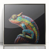 Framed wall art featuring a vibrant chameleon design with intricate details, set in a sleek silver frame, perfect for enhancing modern home decor.