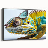 Framed canvas wall art showcasing a vibrant chameleon design in striking colors, displayed from a side view against a sleek black frame, perfect for reptile enthusiasts.