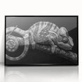 Framed wall art featuring a vibrant chameleon design with intricate details on a black background, showcasing a modern aesthetic perfect for reptile enthusiasts.