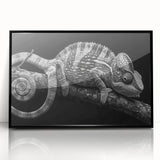 Framed wall art featuring a vibrant chameleon design with intricate details on a black background, showcasing a modern aesthetic perfect for reptile enthusiasts.
