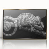 Framed wall art showcasing a vibrant chameleon design in shades of green and blue, set against a gold-accented background. Ideal for reptile enthusiasts and modern decor.