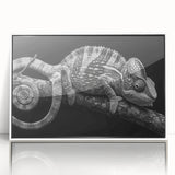 Framed acrylic wall art featuring a vibrant chameleon design, set against a sleek white background, perfect for enhancing modern decor and reptile-themed spaces.