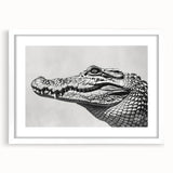 Framed wall art featuring a vibrant design of reptiles, including alligators and crocodiles, set against a white mat, perfect for wildlife enthusiasts’ decor.