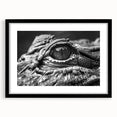 Framed wall art featuring a stunning reptile design showcasing alligators and crocodiles, presented in a sleek black frame with a white mat for a modern touch. Ideal for nature enthusiasts and wildlife decor.