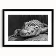 Framed wall art collection featuring a vibrant design of reptiles, gators, and crocodiles, set against a sleek black mat, perfect for nature enthusiasts.