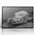 Framed wall art featuring a vibrant, detailed design of reptiles, including gators and crocodiles, set in a sleek black frame for modern decor. Perfect for wildlife enthusiasts.