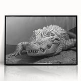 Framed wall art featuring a vibrant, detailed design of reptiles, including gators and crocodiles, set in a sleek black frame for modern decor. Perfect for wildlife enthusiasts.
