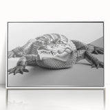 Framed acrylic wall art featuring a detailed design of reptiles, including alligators and crocodiles, showcased in a sleek white frame, perfect for nature-themed decor.